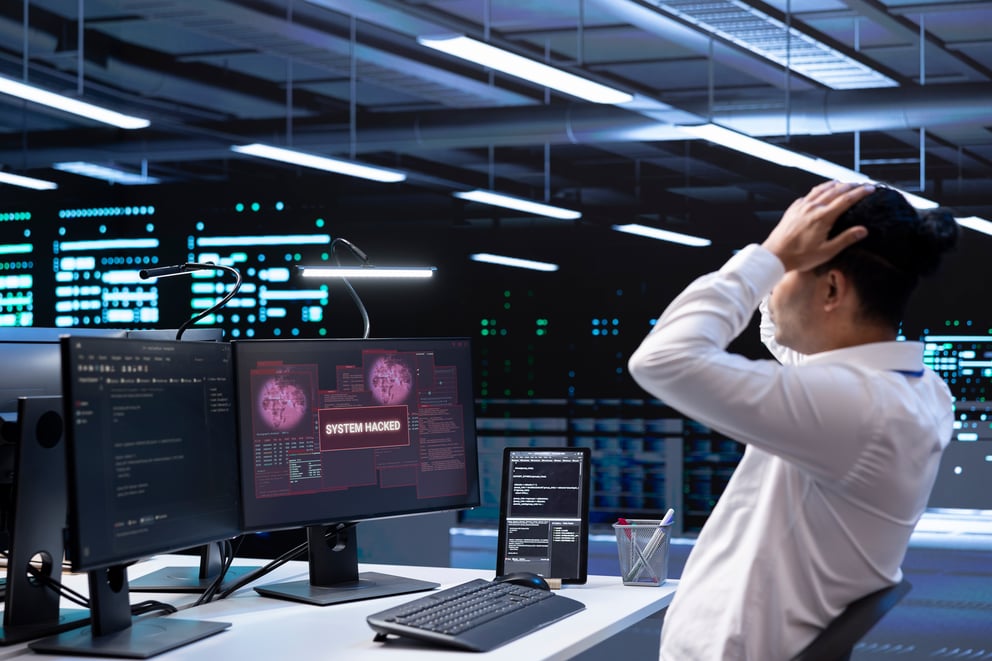 https://sibermate.com/hubfs/close-up-data-center-employee-stressed-by-security-breach-alert-1.jpg