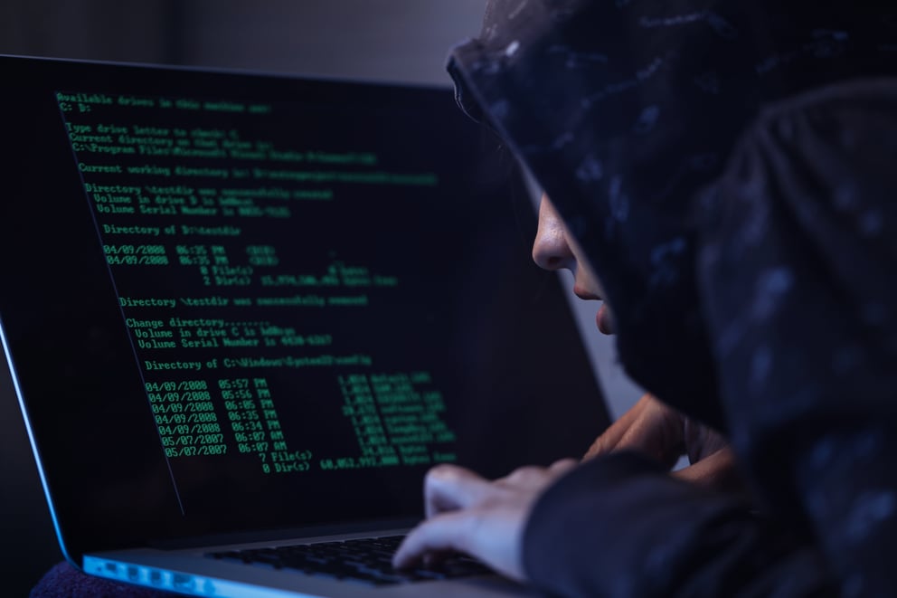 https://sibermate.com/hubfs/computer-hacker-hooded-shirt-typing-software-algorithms-stealing-data-from-computer-network-laptop.jpg